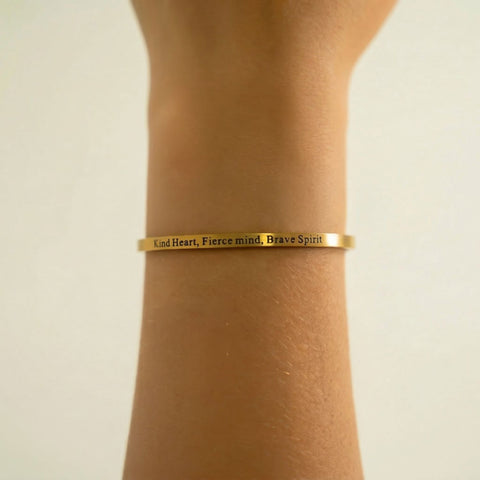 18 Karat Gold PVD Stainless Steel "Kind Heart Fierce Mind" Cuff Bracelet Item #: w2883